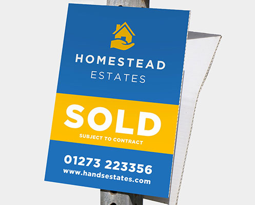 Estate agent correx board on lamp post
